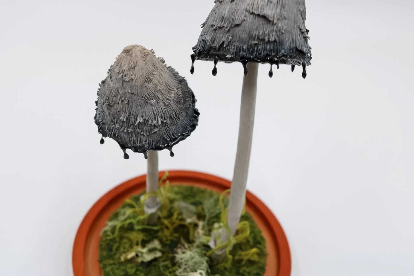 Shaggy mane ink cap mushroom sculpture